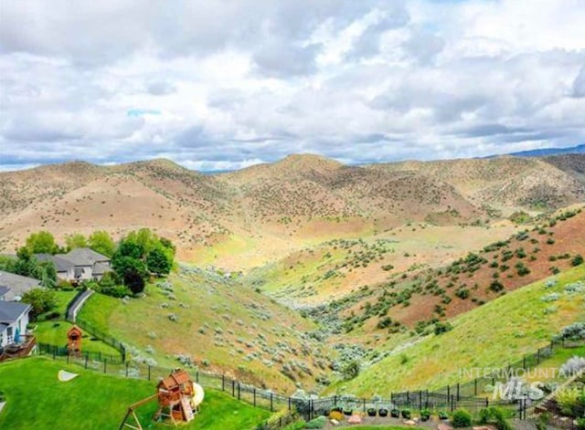 view of mountain feature with a rural view