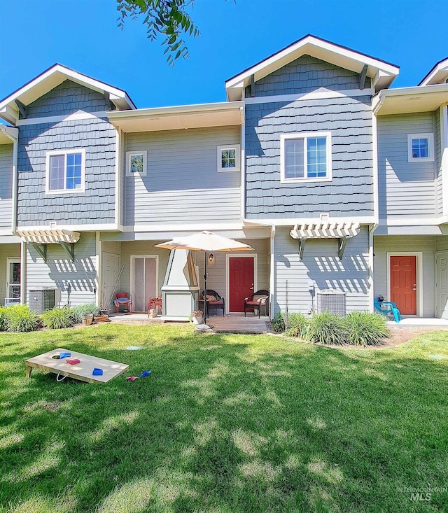 11233 W Gabrielle Dr, Boise, ID 83713 - rear view of property featuring a patio and a yard