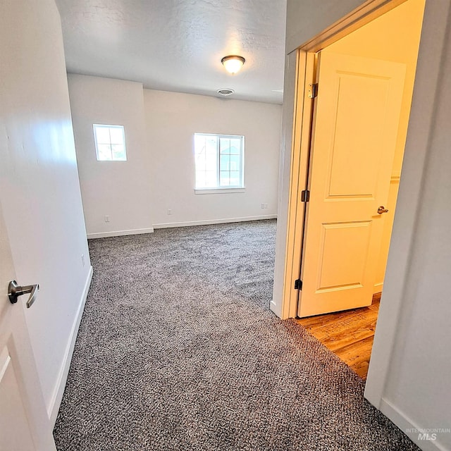 11233 W Gabrielle Dr, Boise, ID 83713 - carpeted empty room with baseboards