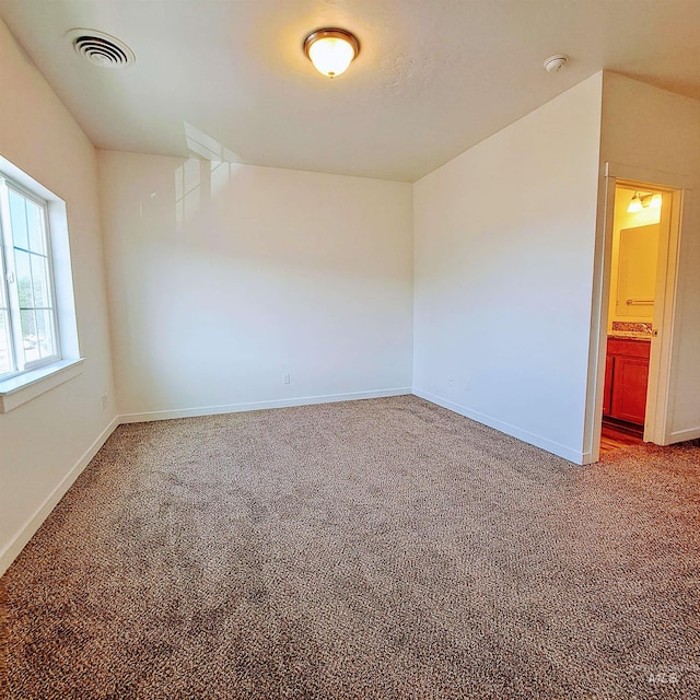 11233 W Gabrielle Dr, Boise, ID 83713 - unfurnished room featuring carpet floors, baseboards, and a smoke detector