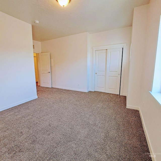 11233 W Gabrielle Dr, Boise, ID 83713 - unfurnished bedroom featuring carpet floors, baseboards, and a closet