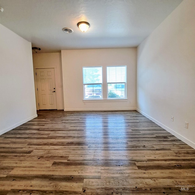 11233 W Gabrielle Dr, Boise, ID 83713 - spare room with wood finished floors and baseboards