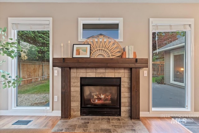11909 W Patrina Dr, Boise, ID 83713 - detailed view of a fireplace and wood finished floors