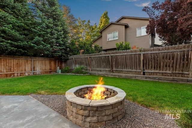 11909 W Patrina Dr, Boise, ID 83713 - view of yard featuring a fire pit and a patio area