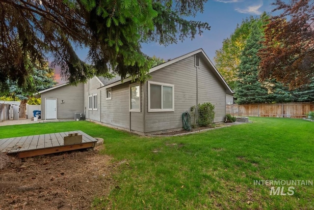 11909 W Patrina Dr, Boise, ID 83713 - back of house featuring central air condition unit and a wooden deck