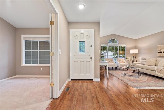 11909 W Patrina Dr, Boise, ID 83713 - entrance foyer with lofted ceiling, baseboards, and wood finished floors