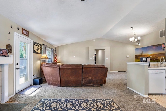 914 Aspenwood Ln, Twin Falls, ID 83301 - living room featuring light carpet, a chandelier, lofted ceiling, and baseboards