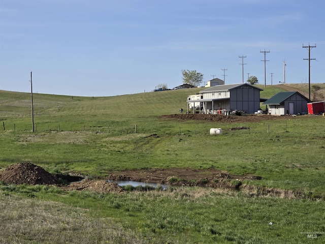 1086 Highland Ln, Mesa, ID 83643 - view of grassy yard featuring an outdoor structure and a rural view