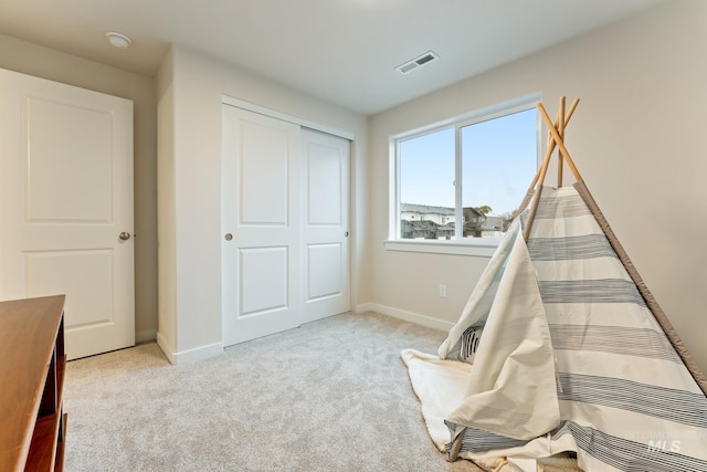 game room featuring visible vents, carpet, and baseboards
