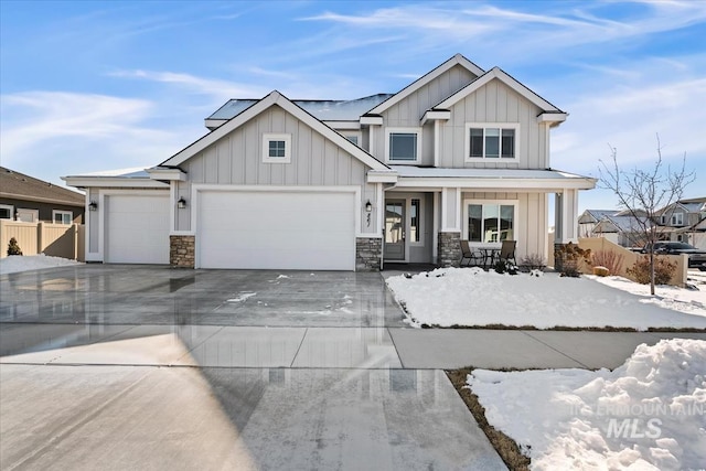 view of front of home with a garage and a porch