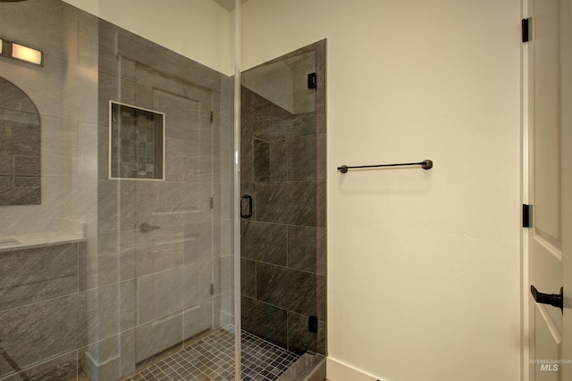 bathroom featuring a stall shower