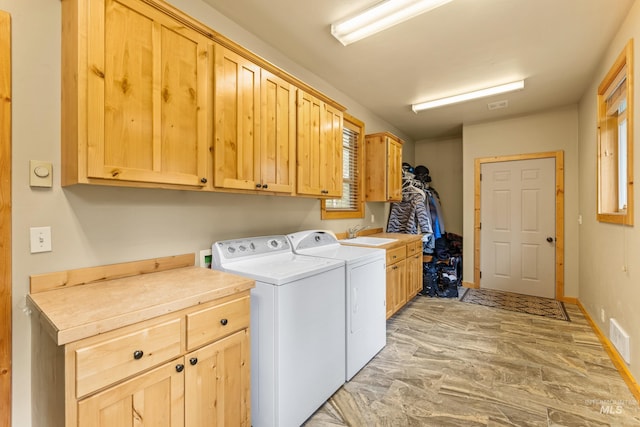 14199 Franklin Rd, Mccall, ID 83638 - laundry room featuring cabinet space and washing machine and dryer