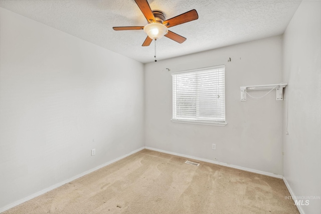 5101 Barkley Way, Caldwell, ID 83607 - carpeted spare room with a textured ceiling, a ceiling fan, and baseboards