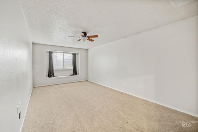 5101 Barkley Way, Caldwell, ID 83607 - carpeted spare room featuring ceiling fan, a textured ceiling, and baseboards