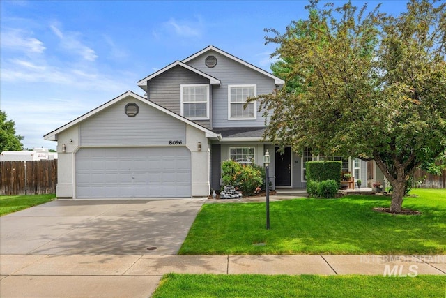 8096 E Jacob, Nampa, ID 83687 - traditional-style house featuring concrete driveway and a garage