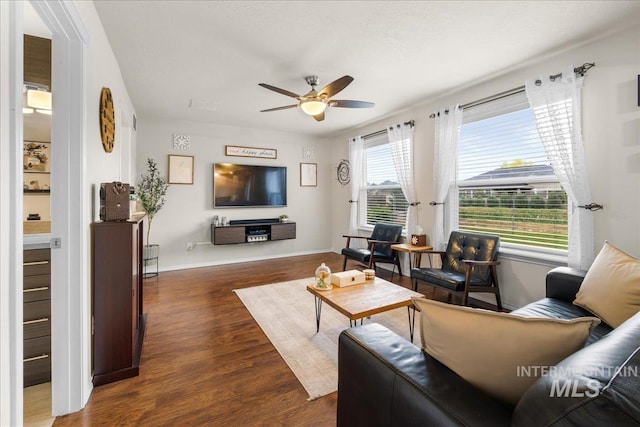 8096 E Jacob, Nampa, ID 83687 - living area with a ceiling fan and wood finished floors