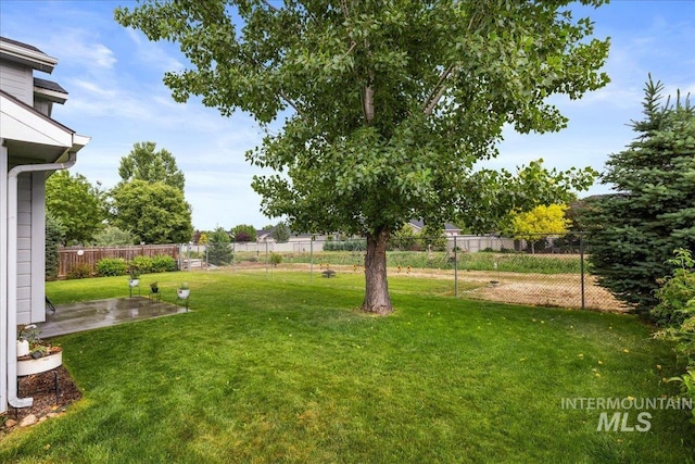 8096 E Jacob, Nampa, ID 83687 - fenced backyard featuring a patio