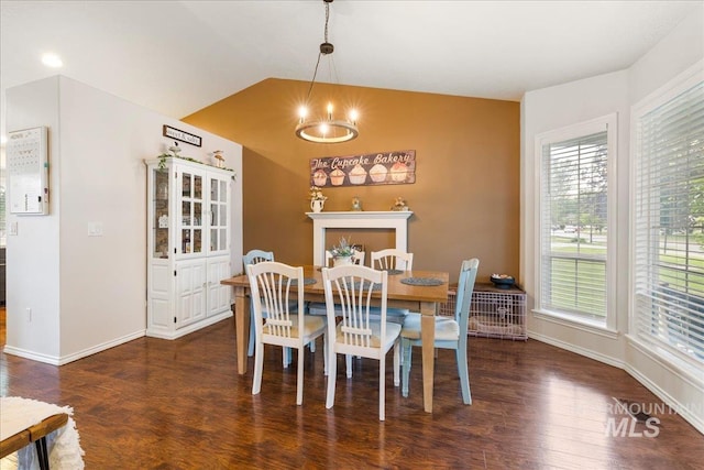 8096 E Jacob, Nampa, ID 83687 - dining area with healthy amount of natural light, wood finished floors, and vaulted ceiling