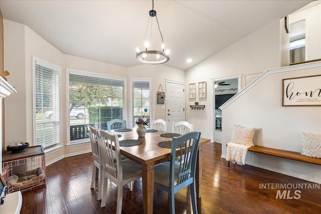 8096 E Jacob, Nampa, ID 83687 - dining room with dark wood-style flooring, a chandelier, and lofted ceiling