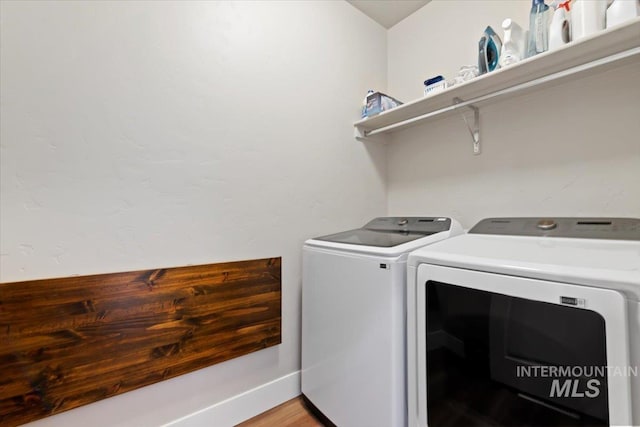 laundry area with washer and dryer and laundry area