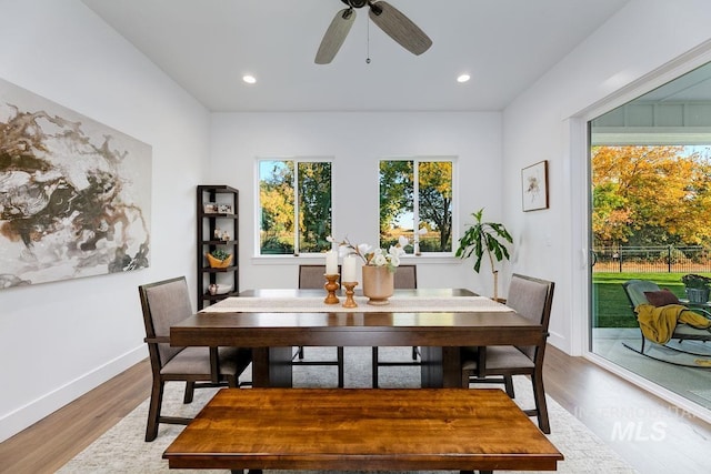 dining area featuring recessed lighting, ceiling fan, baseboards, and wood finished floors