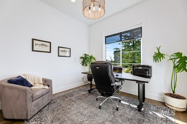 office with baseboards and wood finished floors