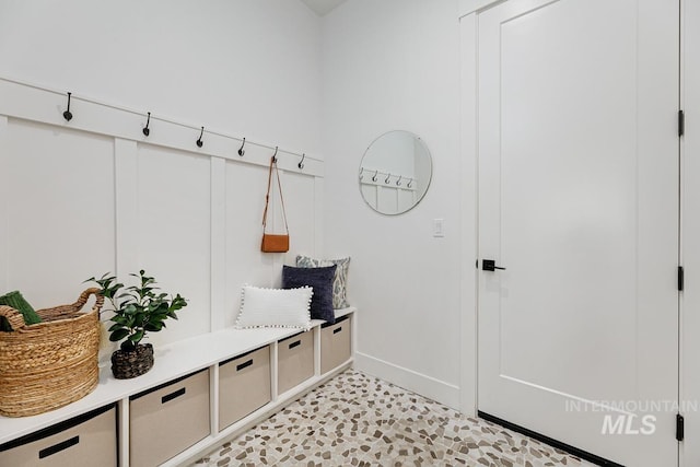 mudroom featuring baseboards