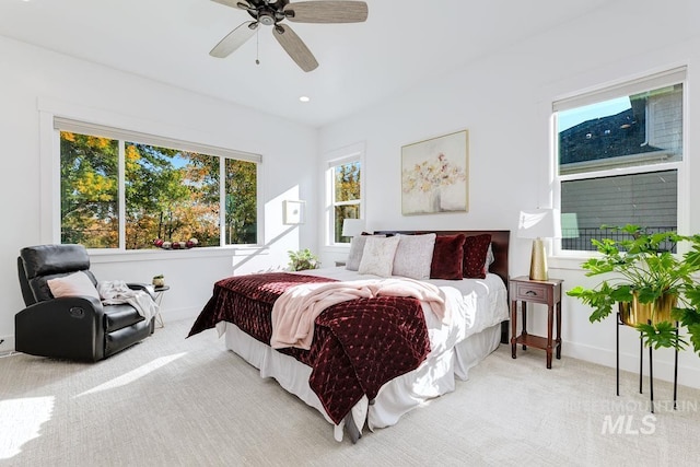 carpeted bedroom with a ceiling fan, recessed lighting, and baseboards