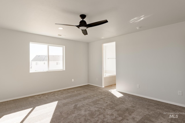 empty room with carpet and ceiling fan