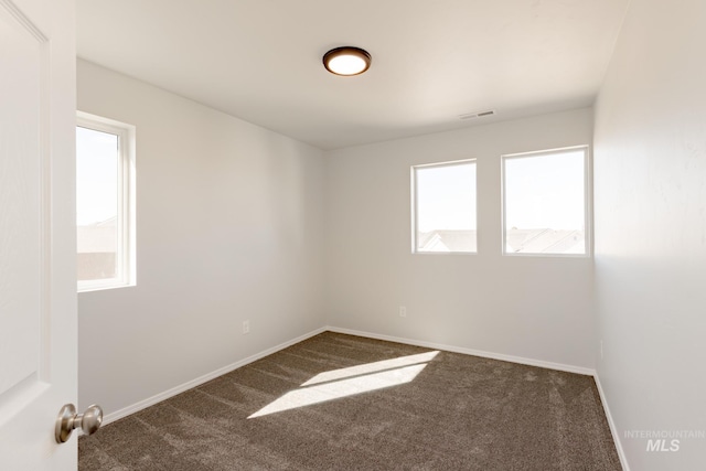 unfurnished room with carpet