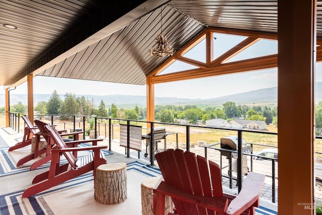 balcony featuring a mountain view