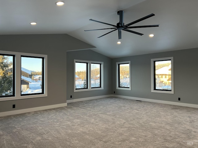 empty room with recessed lighting, a ceiling fan, lofted ceiling, and carpet flooring