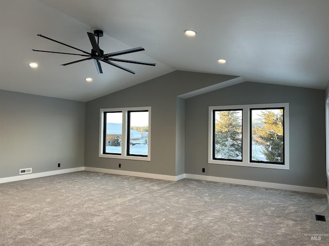 carpeted empty room with recessed lighting, a ceiling fan, baseboards, and lofted ceiling
