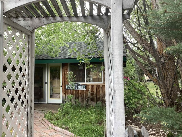 exterior space with a pergola