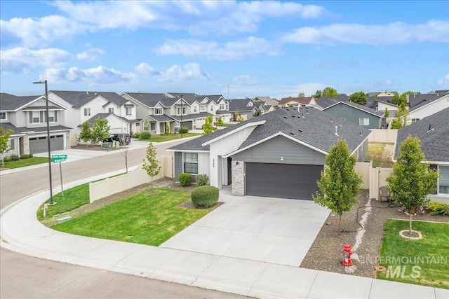 5144 W W Grand Rapids Dr, Meridian, ID 83646 - view of front of house with a residential view, an attached garage, and driveway