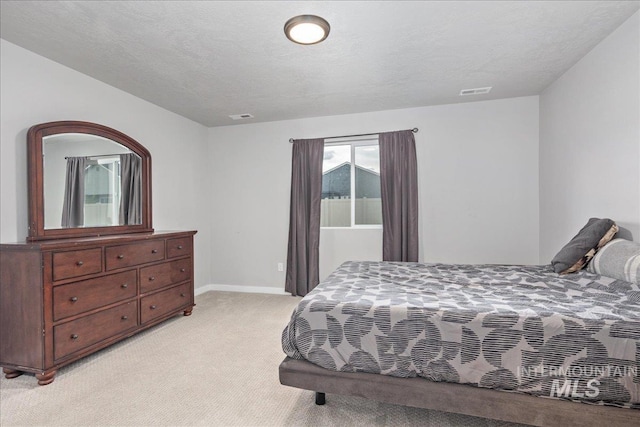 5144 W W Grand Rapids Dr, Meridian, ID 83646 - bedroom with light carpet and baseboards