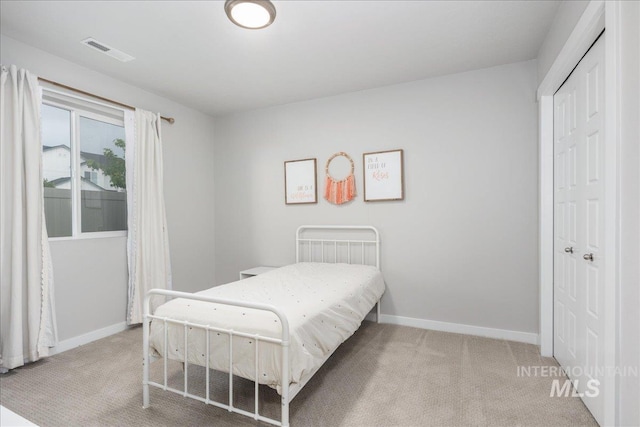 5144 W W Grand Rapids Dr, Meridian, ID 83646 - carpeted bedroom with baseboards and a closet