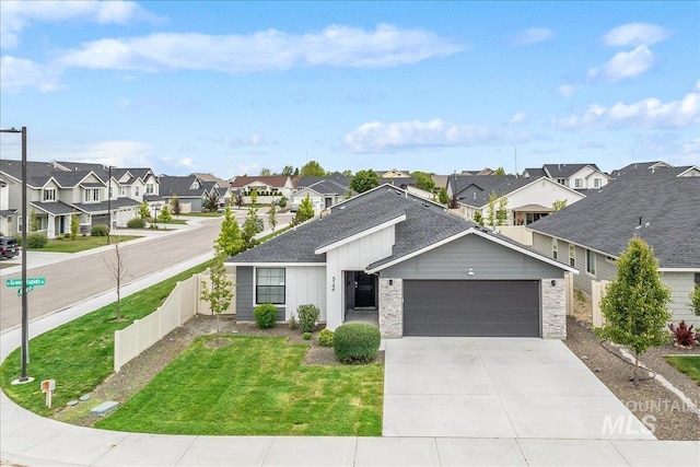 5144 W W Grand Rapids Dr, Meridian, ID 83646 - view of front facade featuring a residential view, an attached garage, concrete driveway, and a shingled roof