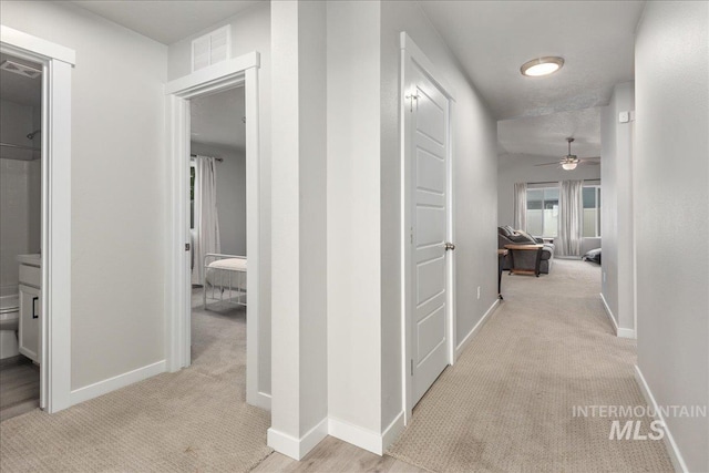 5144 W W Grand Rapids Dr, Meridian, ID 83646 - corridor featuring carpet flooring and baseboards
