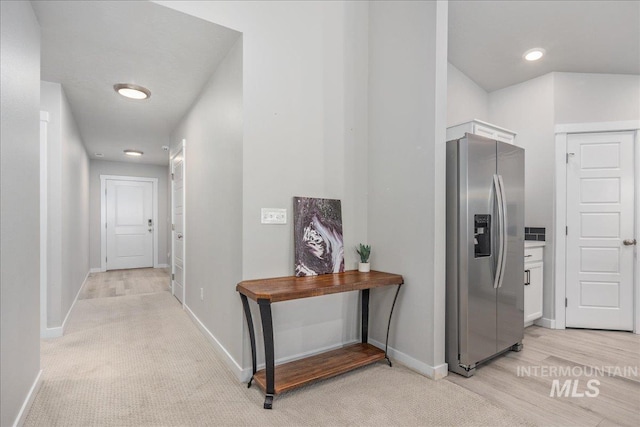 5144 W W Grand Rapids Dr, Meridian, ID 83646 - hallway featuring baseboards and light colored carpet