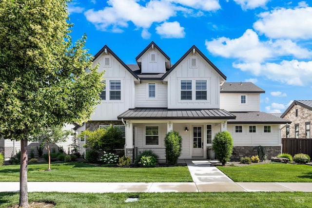 3122 W Hidden Springs Dr, Boise, ID 83714 - view of front of property featuring stone siding, board and batten siding, a porch, a standing seam roof, and a metal roof