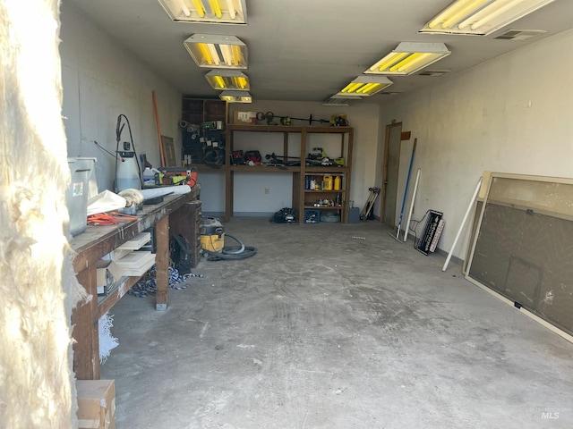 garage featuring a workshop area