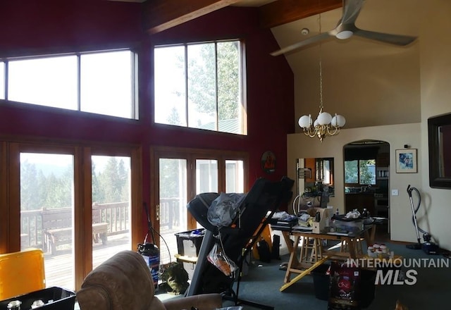 2597 Price Valley Rd, New Meadows, ID 83654 - living room with ceiling fan, high vaulted ceiling, a chandelier, and arched walkways
