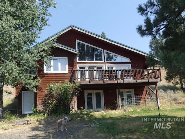 2597 Price Valley Rd, New Meadows, ID 83654 - rear view of property featuring a wooden deck, french doors, and stairs
