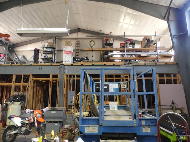 2597 Price Valley Rd, New Meadows, ID 83654 - miscellaneous room with a workshop area, vaulted ceiling, and a garage