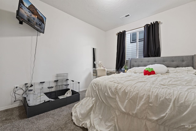 bedroom featuring carpet flooring and vaulted ceiling