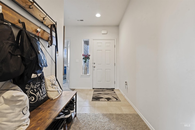 mudroom with light tile patterned floors