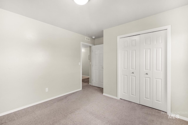 811 Pronghorn Dr, Twin Falls, ID 83301 - unfurnished bedroom with carpet flooring, baseboards, and a closet