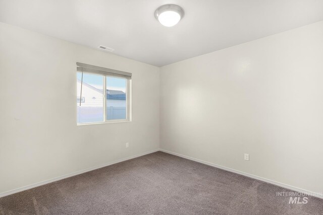 811 Pronghorn Dr, Twin Falls, ID 83301 - carpeted empty room with baseboards