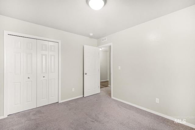 811 Pronghorn Dr, Twin Falls, ID 83301 - unfurnished bedroom with carpet, baseboards, and a closet